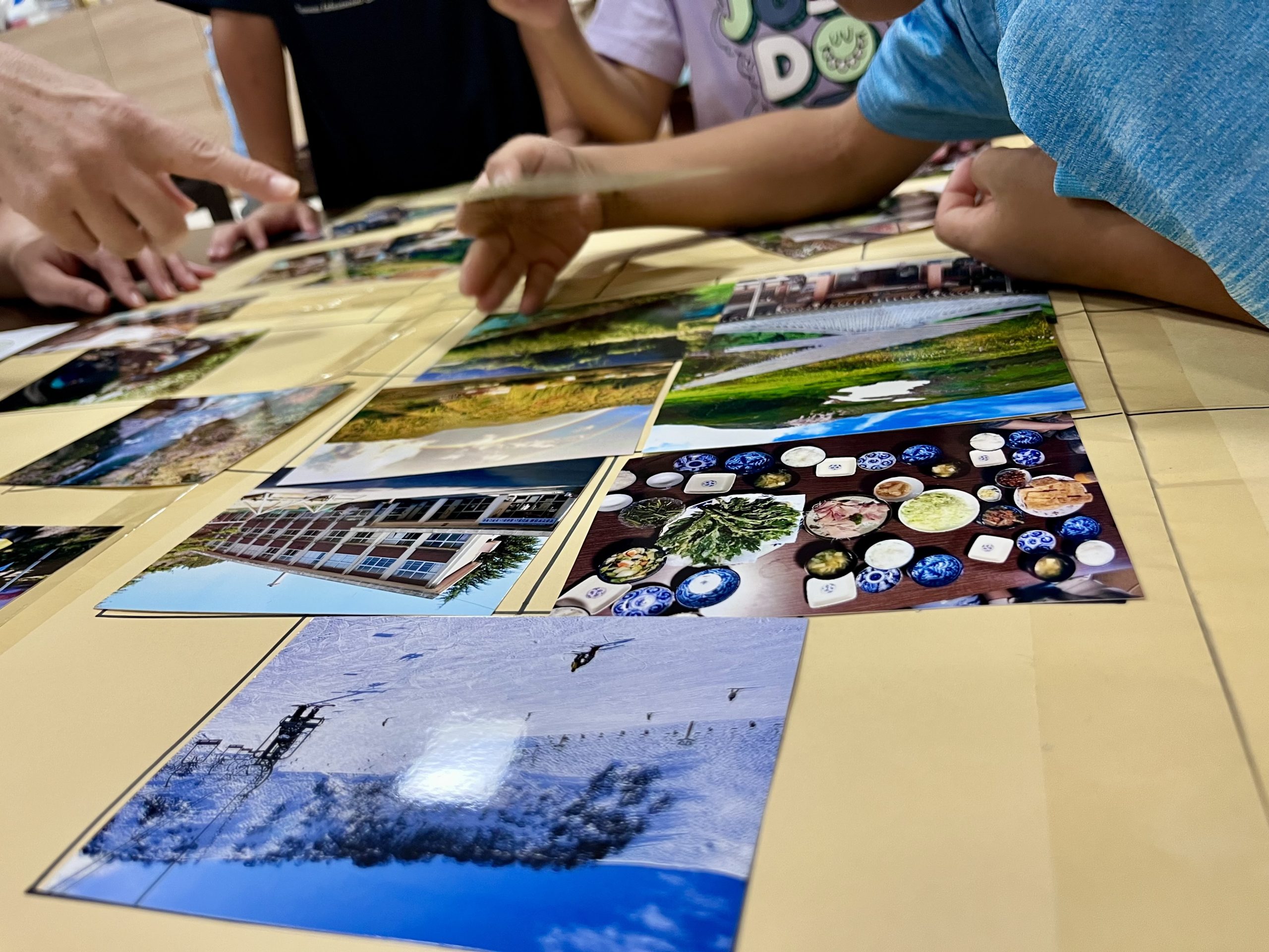 Children participating in photo sorting activity at Shiramine kindergarten