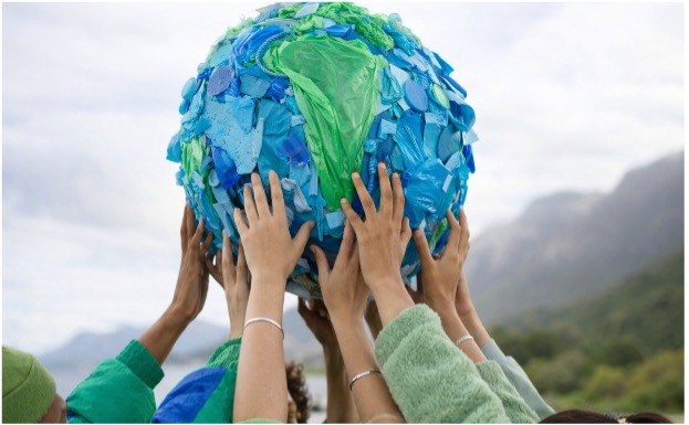 Hands holding a globe — climate action